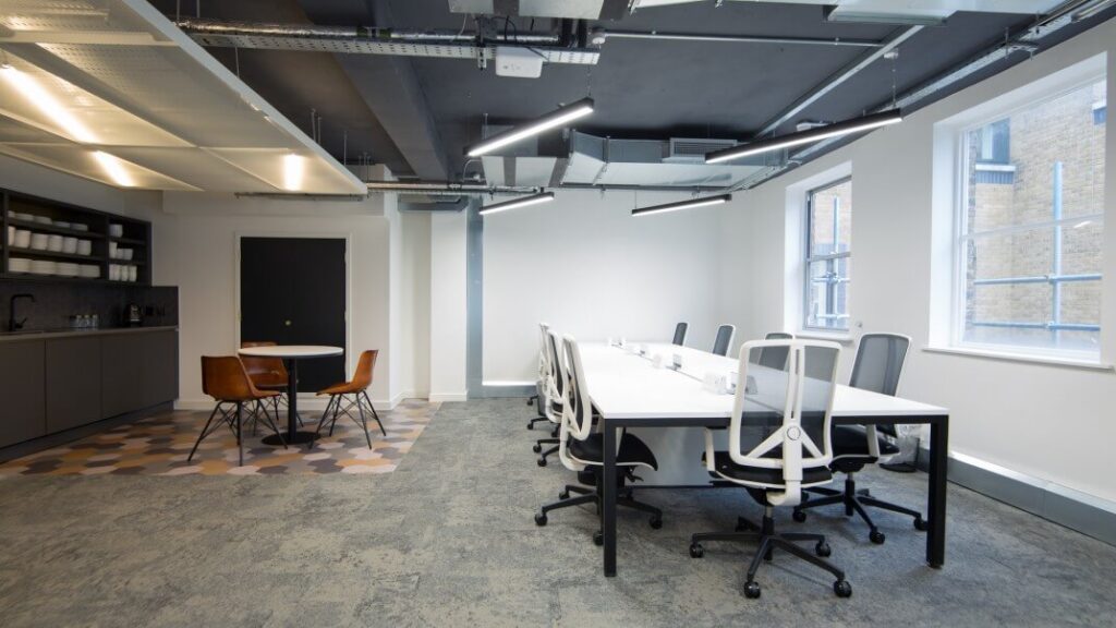 TBWC Carter Lane open-plan desks beneath an exposed services ceiling