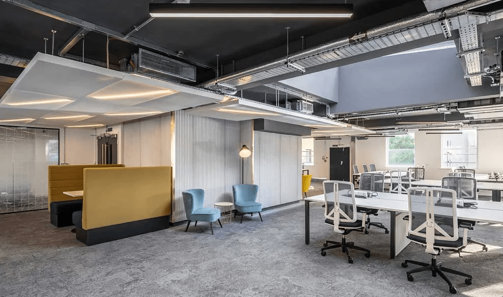TBWC Carter Lane breakout lounge with booth seating and blue armchairs