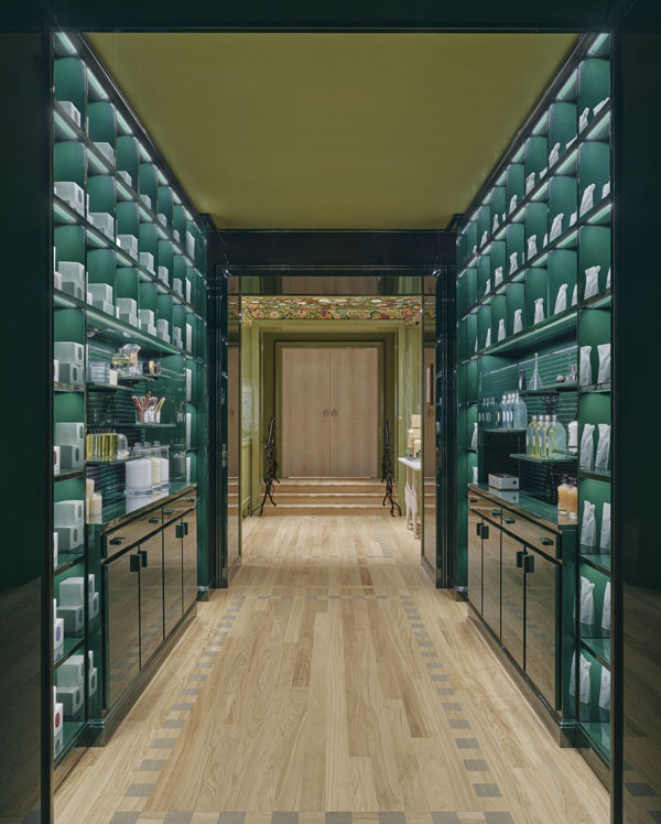 Diptyque Bond Street green lacquered corridor linking the boutique's retail zones