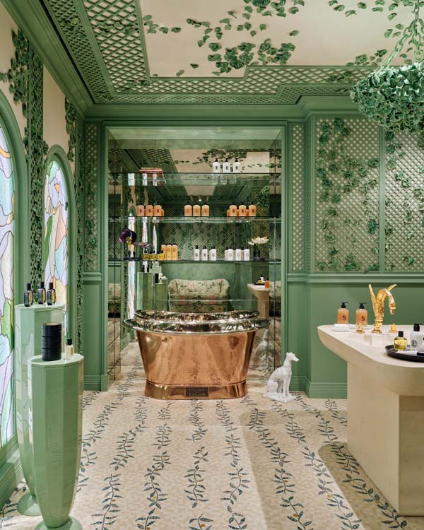 Diptyque Bond Street bath zone with a copper freestanding tub
