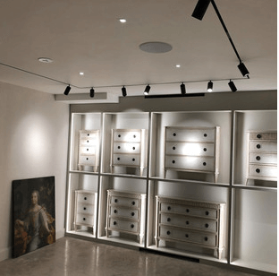 Chelsea Textiles showroom with concealed ceiling detection above display cabinets
