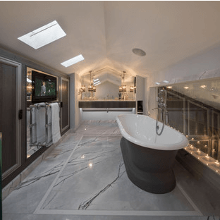 Chelsea Townhouse Development loft bathroom with freestanding bath and concealed television