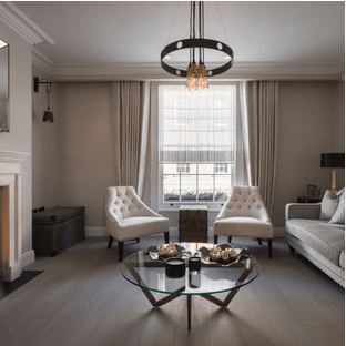 Chelsea Townhouse Development sitting room with fireplace and sash window